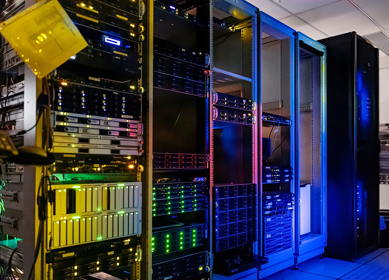 Server room racks representing distributed organisational infrastructure